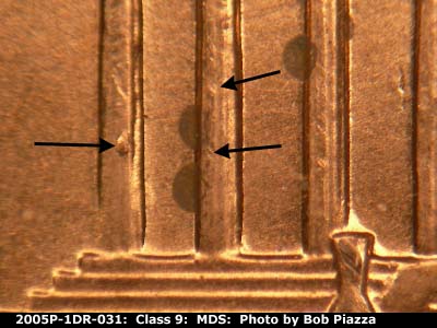 Die-stage B marker on 2005P•1DR•031 (2005 Doubled Die Reverse).
