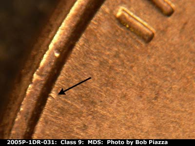 Die-stage B marker on 2005P•1DR•031 (2005 Doubled Die Reverse).