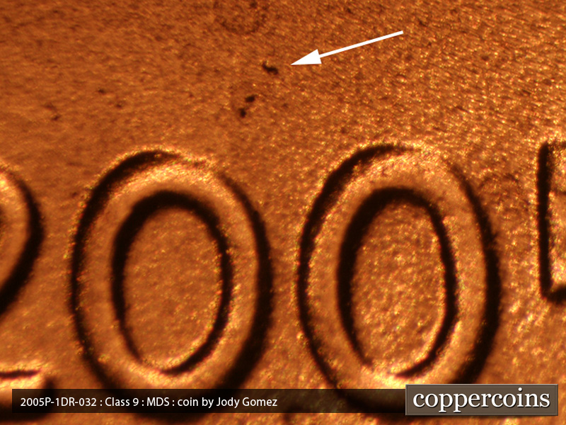 Die-stage B marker on 2005P•1DR•032 (2005 Doubled Die Reverse).