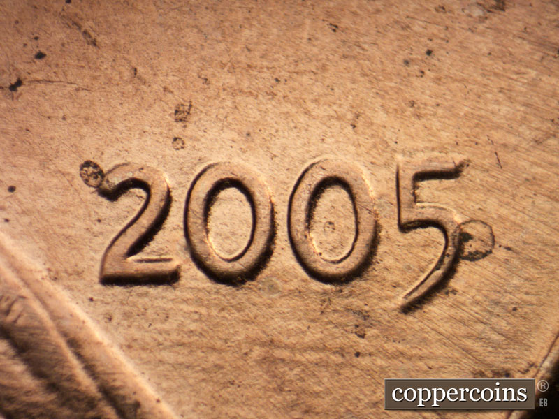 Die-stage B marker on 2005P•1DR•036 (2005 Doubled Die Reverse).
