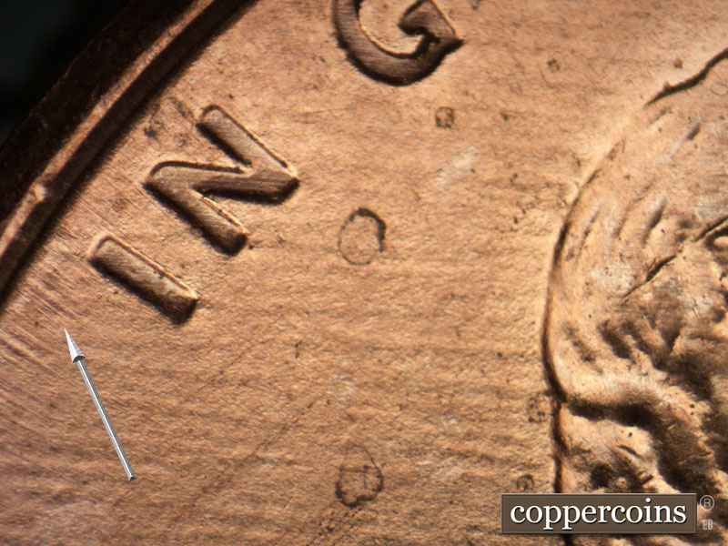 Die-stage B marker on 2005P•1DR•036 (2005 Doubled Die Reverse).
