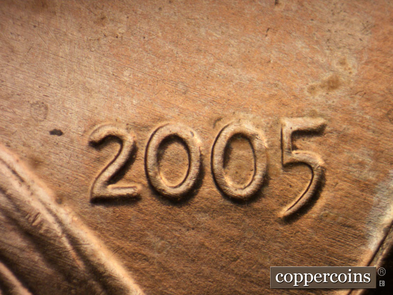 Die-stage B marker on 2005P•1DR•037 (2005 Doubled Die Reverse).