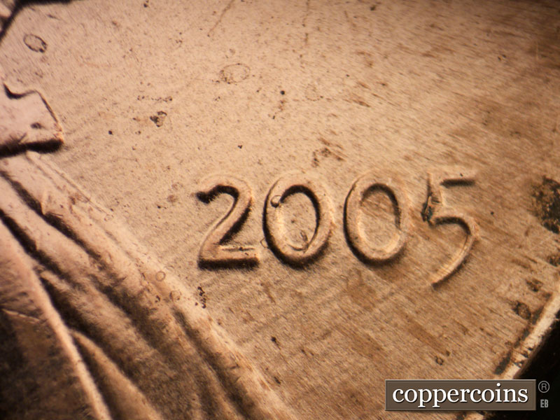 Die-stage B marker on 2005P•1DR•038 (2005 Doubled Die Reverse).
