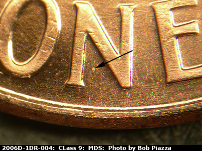 Die-stage B marker on 2006D•1DR•004 (2006 Doubled Die Reverse).