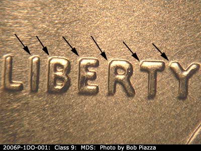 Die-stage B marker on 2006P•1DO•001 (2006 Doubled Die Obverse).