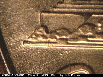 Die-stage B marker on 2006P•1DO•001 (2006 Doubled Die Obverse).