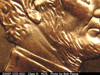 Die-stage B marker on 2006P•1DO•002 (2006 Doubled Die Obverse).