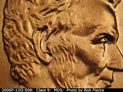 Die-stage B marker on 2006P•1DO•008 (2006 Doubled Die Obverse).