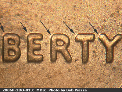Die-stage B marker on 2006P•1DO•013 (2006 Doubled Die Obverse).