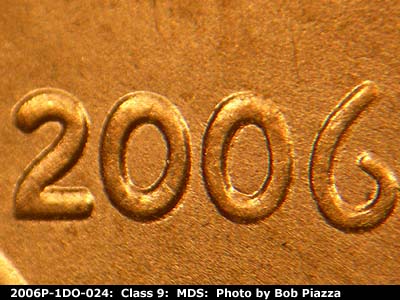 Die-stage B marker on 2006P•1DO•024 (2006 Doubled Die Obverse).