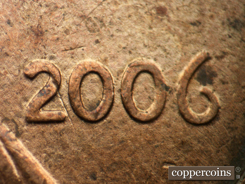 Die-stage B marker on 2006P•1DO•027 (2006 Doubled Die Obverse).