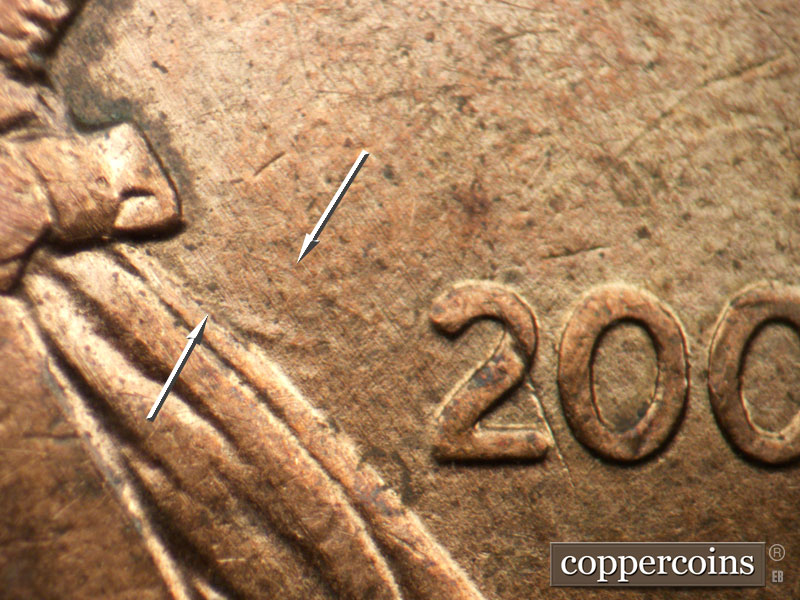 Die-stage B marker on 2006P•1DO•027 (2006 Doubled Die Obverse).