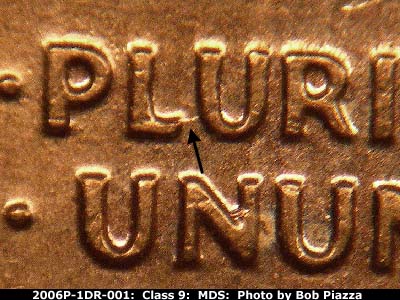Die-stage B marker on 2006P•1DR•001 (2006 Doubled Die Reverse).