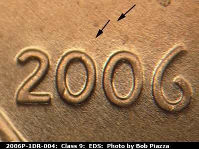 Die-stage A marker on 2006P•1DR•004 (2006 Doubled Die Reverse).