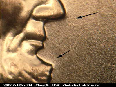 Die-stage A marker on 2006P•1DR•004 (2006 Doubled Die Reverse).