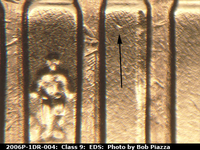 Die-stage A marker on 2006P•1DR•004 (2006 Doubled Die Reverse).
