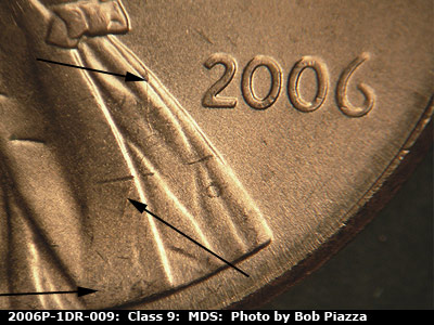 Die-stage B marker on 2006P•1DR•009 (2006 Doubled Die Reverse).