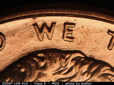 Die-stage B marker on 2006P•1DR•010 (2006 Doubled Die Reverse).
