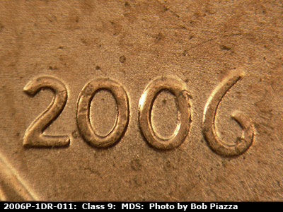 Die-stage B marker on 2006P•1DR•011 (2006 Doubled Die Reverse).