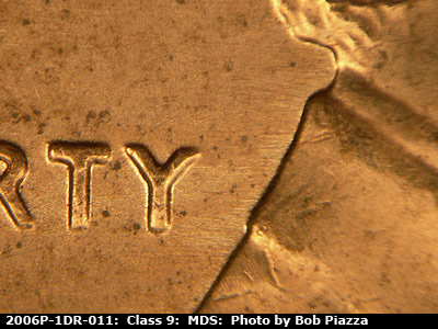 Die-stage B marker on 2006P•1DR•011 (2006 Doubled Die Reverse).