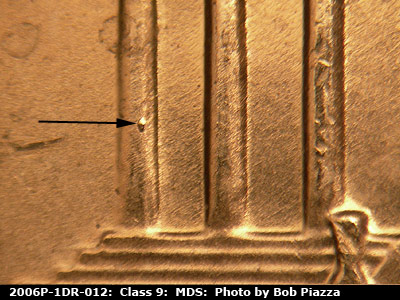 Die-stage B marker on 2006P•1DR•012 (2006 Doubled Die Reverse).