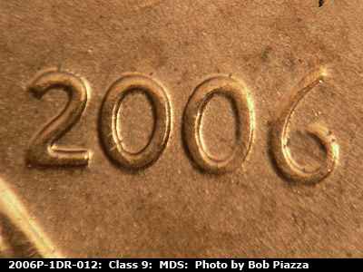 Die-stage B marker on 2006P•1DR•012 (2006 Doubled Die Reverse).