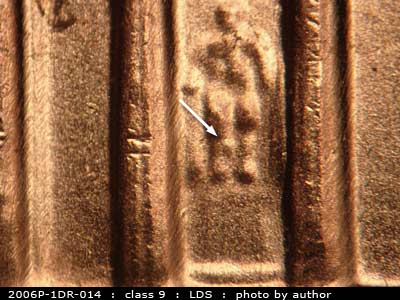 Die-stage C marker on 2006P•1DR•014 (2006 Doubled Die Reverse).