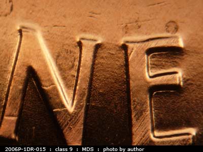 Die-stage B marker on 2006P•1DR•015 (2006 Doubled Die Reverse).