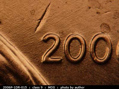 Die-stage B marker on 2006P•1DR•015 (2006 Doubled Die Reverse).
