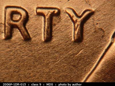 Die-stage B marker on 2006P•1DR•015 (2006 Doubled Die Reverse).