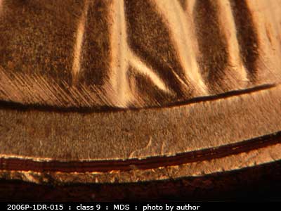 Die-stage B marker on 2006P•1DR•015 (2006 Doubled Die Reverse).