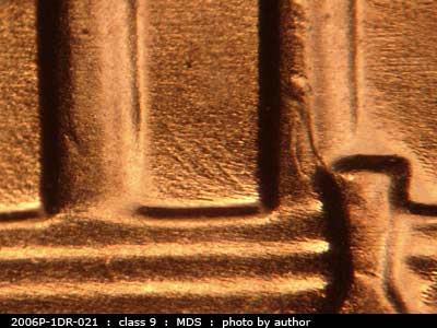 Die-stage B marker on 2006P•1DR•021 (2006 Doubled Die Reverse).