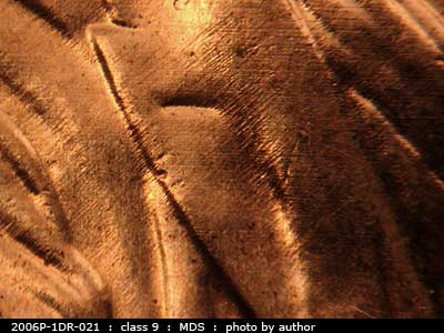 Die-stage B marker on 2006P•1DR•021 (2006 Doubled Die Reverse).