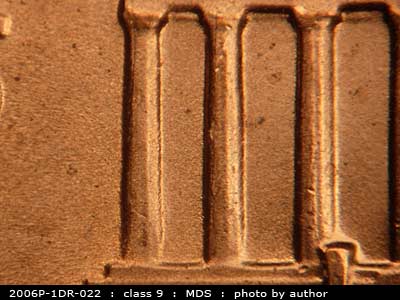 Die-stage C marker on 2006P•1DR•022 (2006 Doubled Die Reverse).