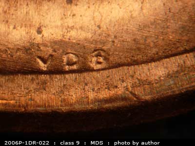 Die-stage C marker on 2006P•1DR•022 (2006 Doubled Die Reverse).