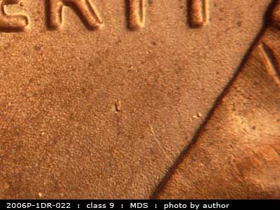 Die-stage C marker on 2006P•1DR•022 (2006 Doubled Die Reverse).