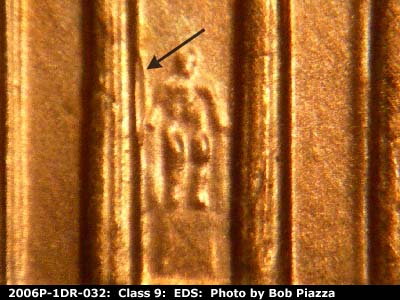 Die-stage A marker on 2006P•1DR•032 (2006 Doubled Die Reverse).