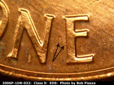 Die-stage A marker on 2006P•1DR•032 (2006 Doubled Die Reverse).