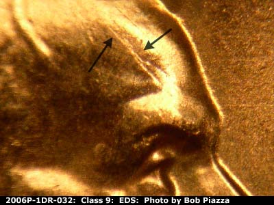 Die-stage A marker on 2006P•1DR•032 (2006 Doubled Die Reverse).