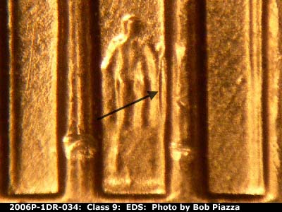 Die-stage A marker on 2006P•1DR•034 (2006 Doubled Die Reverse).