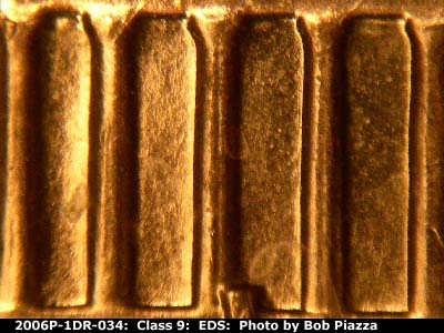 Die-stage A marker on 2006P•1DR•034 (2006 Doubled Die Reverse).