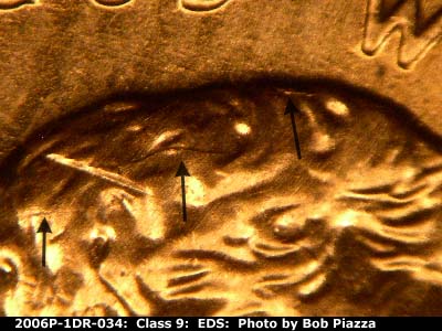 Die-stage A marker on 2006P•1DR•034 (2006 Doubled Die Reverse).