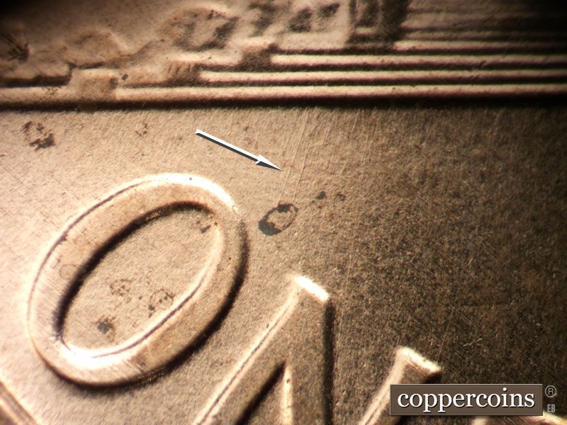 Die-stage B marker on 2006P•1DR•040 (2006 Doubled Die Reverse).