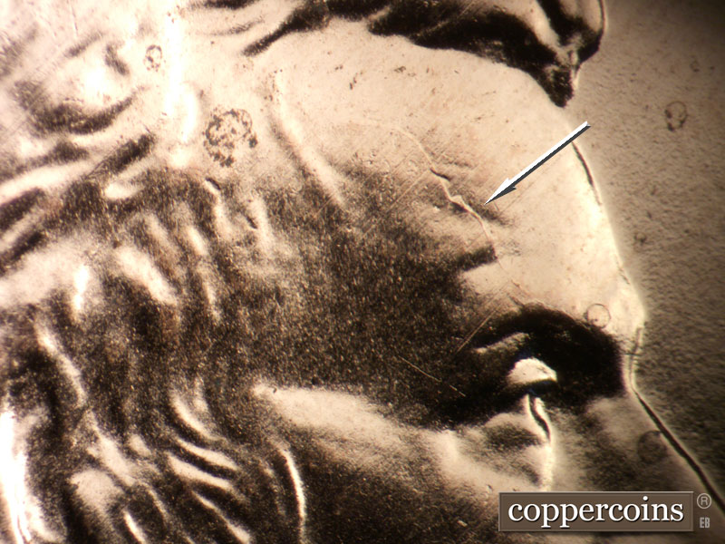 Die-stage B marker on 2006P•1DR•040 (2006 Doubled Die Reverse).