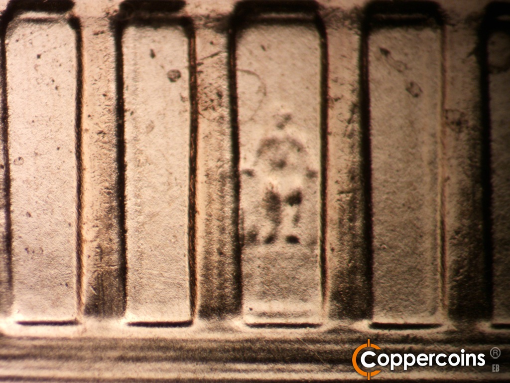 Die-stage B marker on 2006P•1DR•041 showing Doubling seen on the right of column 6 from the foot up to about the knee.