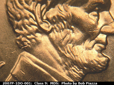 Die-stage B marker on 2007P•1DO•001 (2007 Doubled Die Obverse).