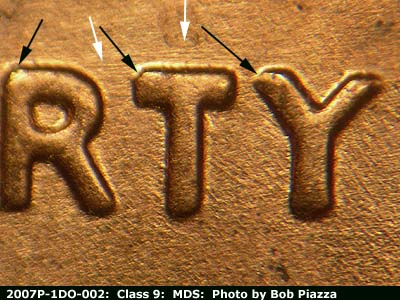 Die-stage B marker on 2007P•1DO•002 (2007 Doubled Die Obverse).