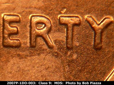 Die-stage B marker on 2007P•1DO•003 (2007 Doubled Die Obverse).