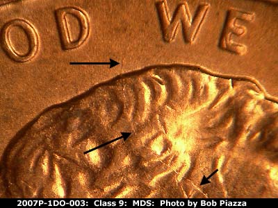 Die-stage B marker on 2007P•1DO•003 (2007 Doubled Die Obverse).