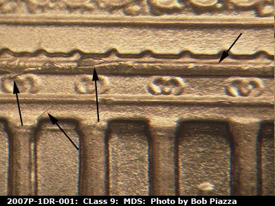 Die-stage B marker on 2007P•1DR•001 (2007 Doubled Die Reverse).